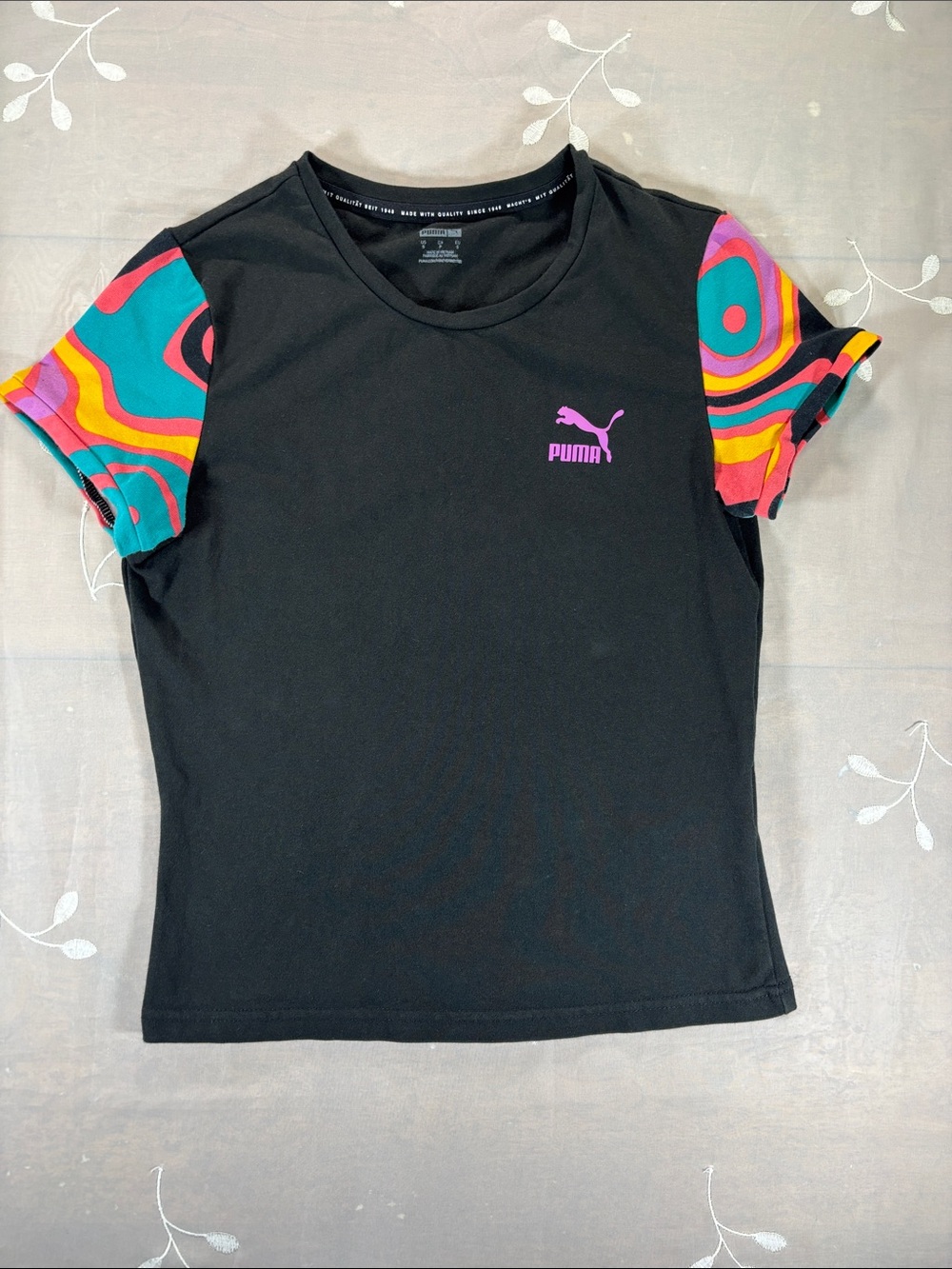 Puma Black Tee with Pink Logo and Multicolor Patterned Sleeves Woman Small